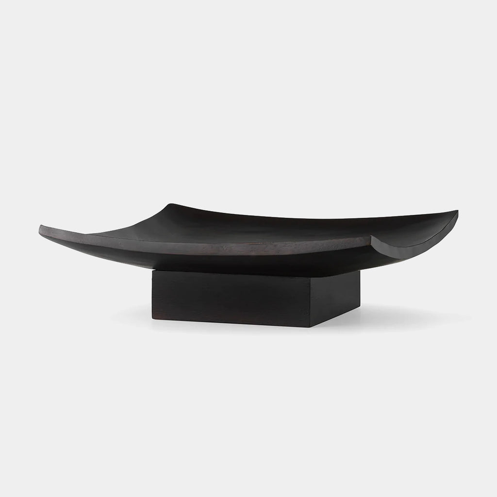 Audo Copenhagen Relevé Platter — acacia wood sculptural platter with floating base and curved edges