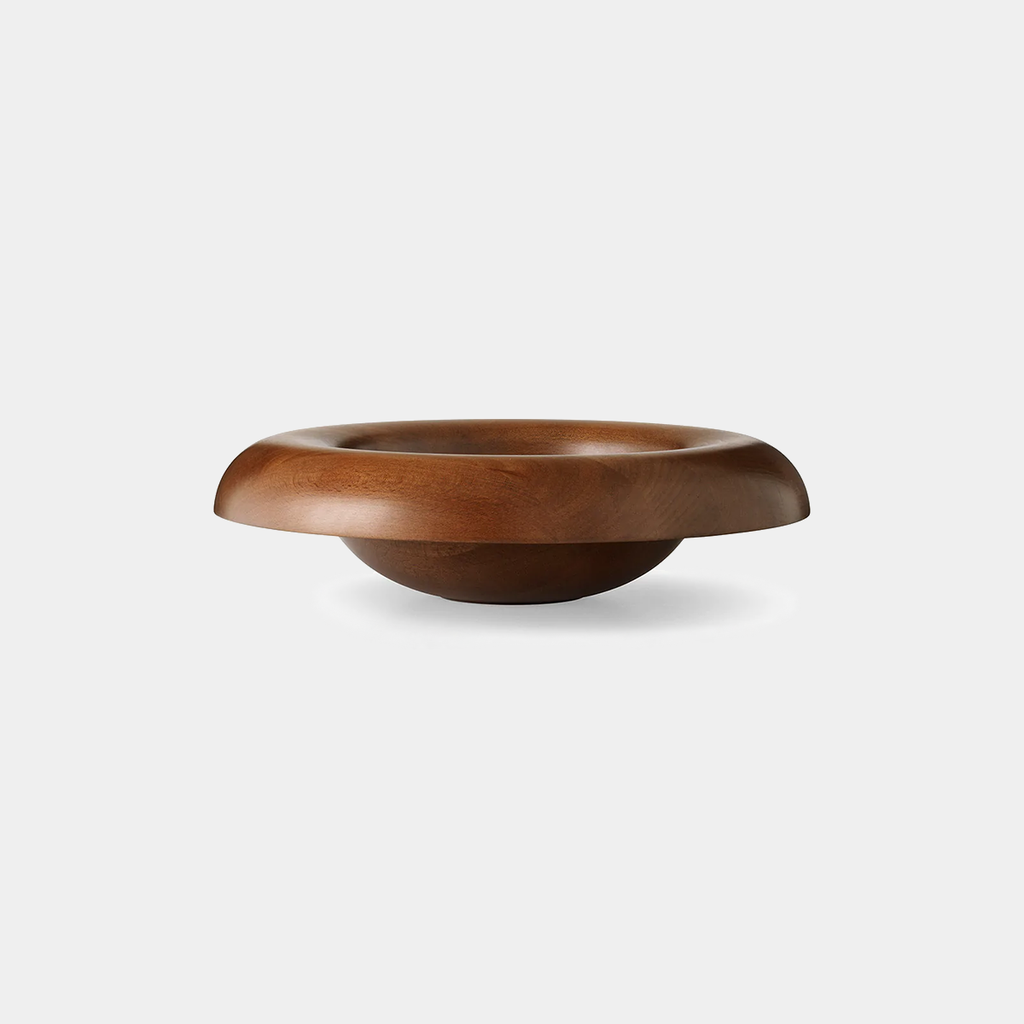 Audo Copenhagen Rond Bowl in solid beech wood with wide lip and sculptural form, shown on a neutral background.