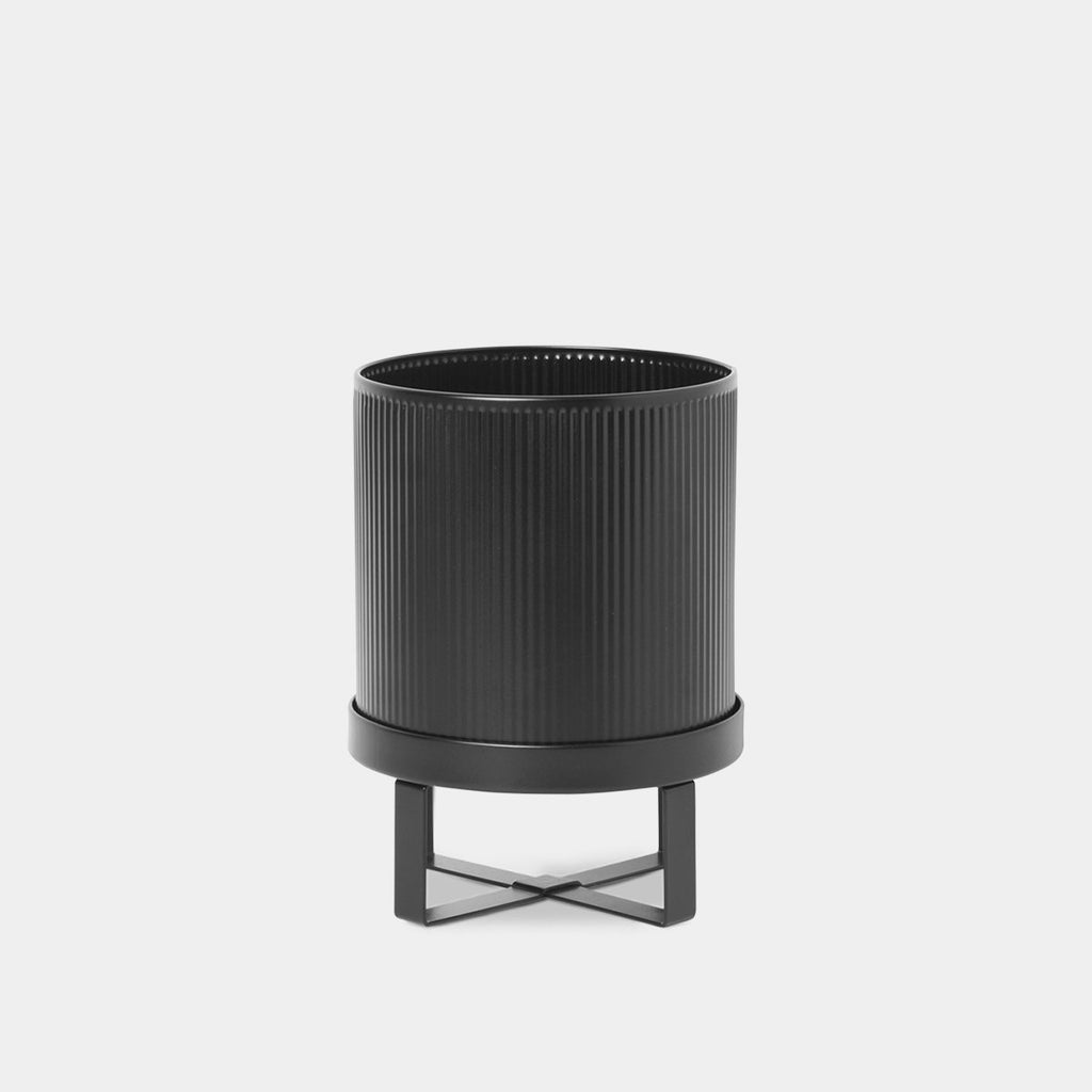 Ferm Living Bau Pot in Black, Small — ribbed powder-coated steel planter with architectural silhouette