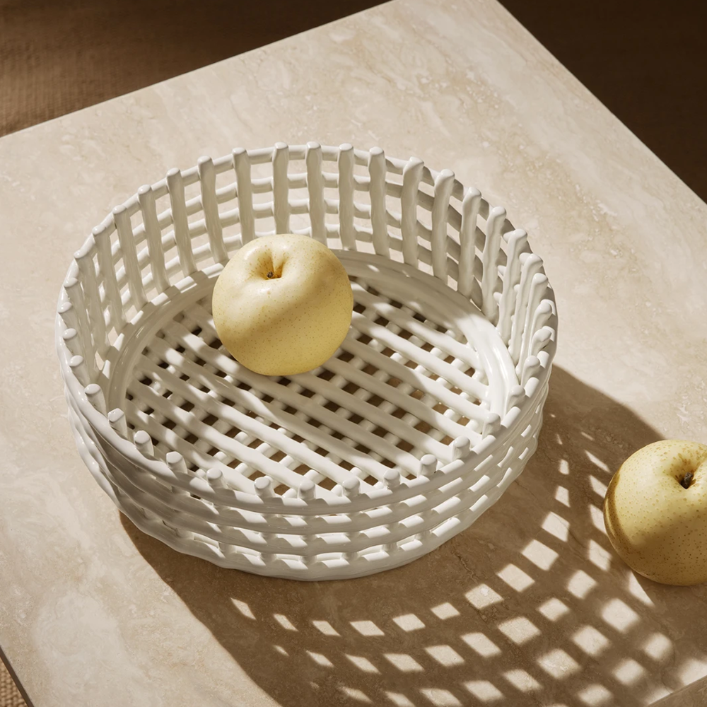 Overhead view of Ceramic Centrepiece by Ferm Living styled with fruit — hand-sculpted ceramic bowl in off white