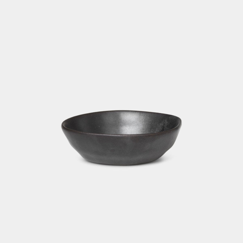 Small Ferm Living Flow Bowl in Black glazed porcelain with semi-matte finish by Ferm Living, available at Nannie Inez.