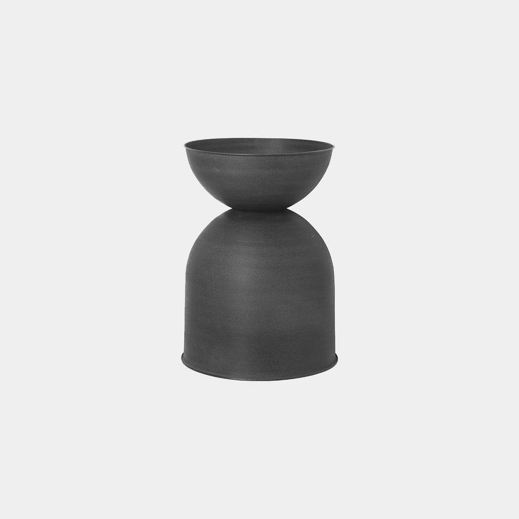 Ferm Living Hourglass Pot in Black, Medium — sculptural matte iron planter with reversible design