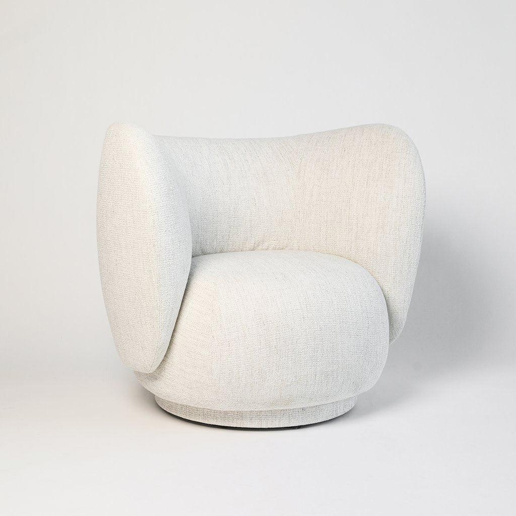 Rico Lounge Chair upholstered in bouclé Off-White on neutral background
