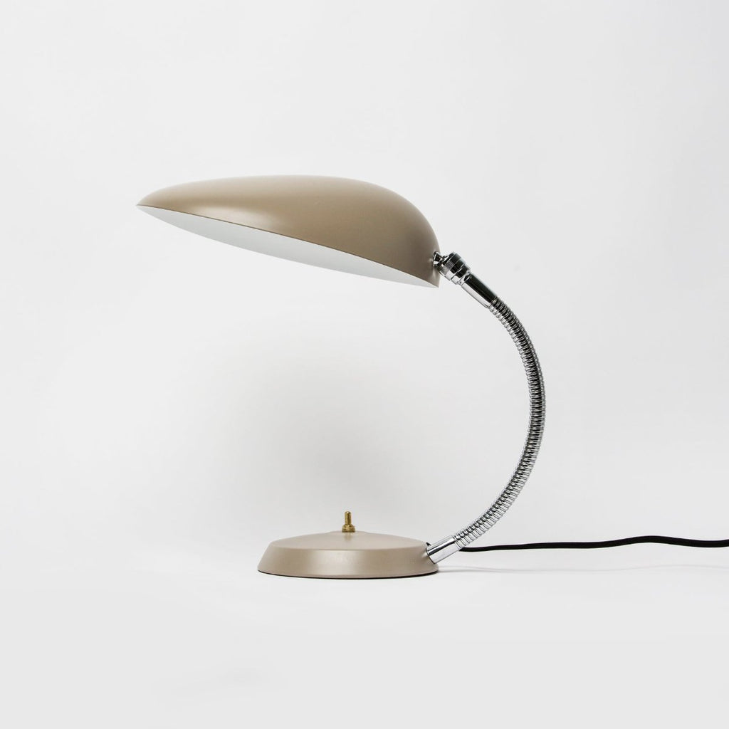 Cobra Table Lamp in grey semi-matte finish with brass hardware, side view